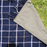 Takarangi Tartan picnic blanket
